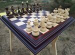 Handmade wooden chess set with traditional board and figures