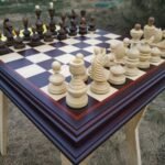 Handmade wooden chess set with traditional board and figures