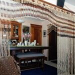 interior design with handmade wooden bead divider