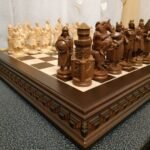 Handmade chess set consists of: classic ash board and "Knigts&Cossacks" pieces