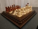 Traditional chess set with carved wooden board and figures