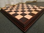 Classic handcrafted ash chess board with dark burgundy edging
