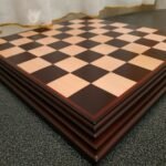 Classic handcrafted ash chess board with dark burgundy edging