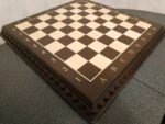 Engraving letters and numbers on a chessboard. - Image 3