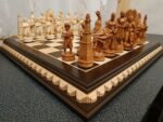 Wooden Game of Thrones chess set with carved board and pieces