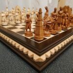Wooden Game of Thrones chess set with carved board and pieces