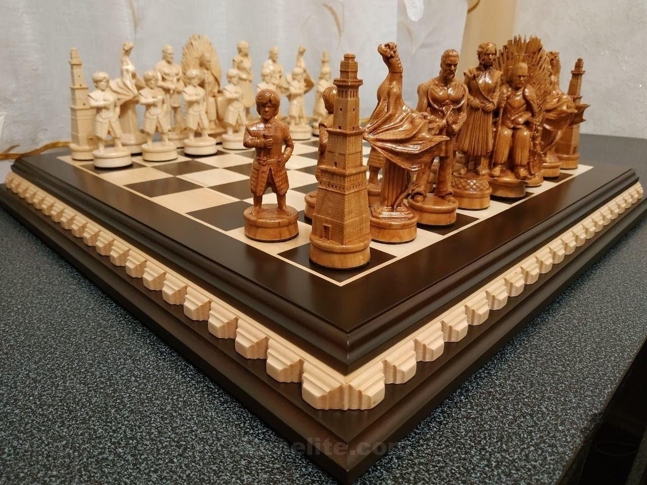 il_fullxfull.2295696044_3pg4.jpg Wooden Game of Thrones chess set with carved board and pieces