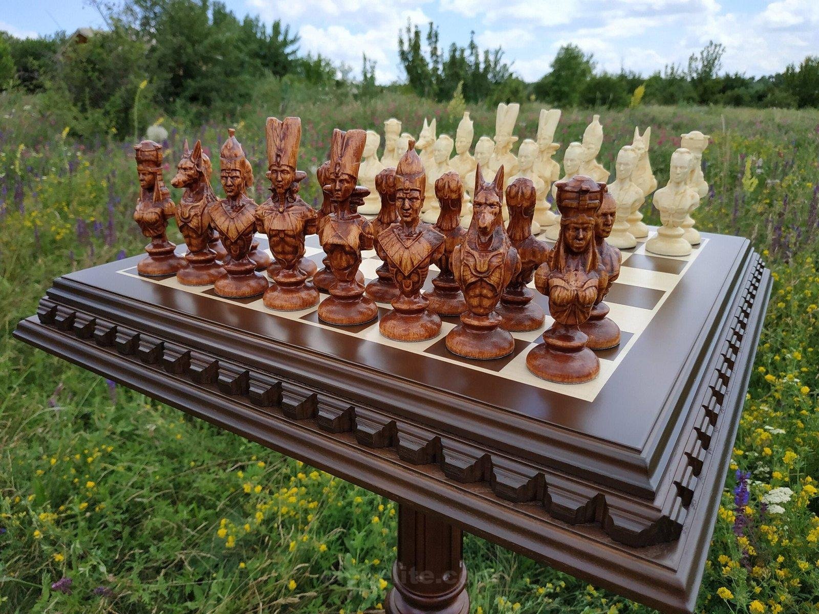 il_fullxfull.3173606878_qs5o-1-scaled-1.jpg chess set with Egyptian-style figures. Classic ash board and maple figures, handmade