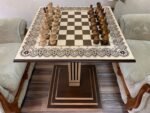 Wooden Chess Set: Chess Table “Waves of Aspiration” + glossy chess pieces "Elite"