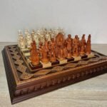 Chess set: a unique handmade chess board decorated with decorative beads, giving it an unusual and expressive look. The set includes 32 chess pieces