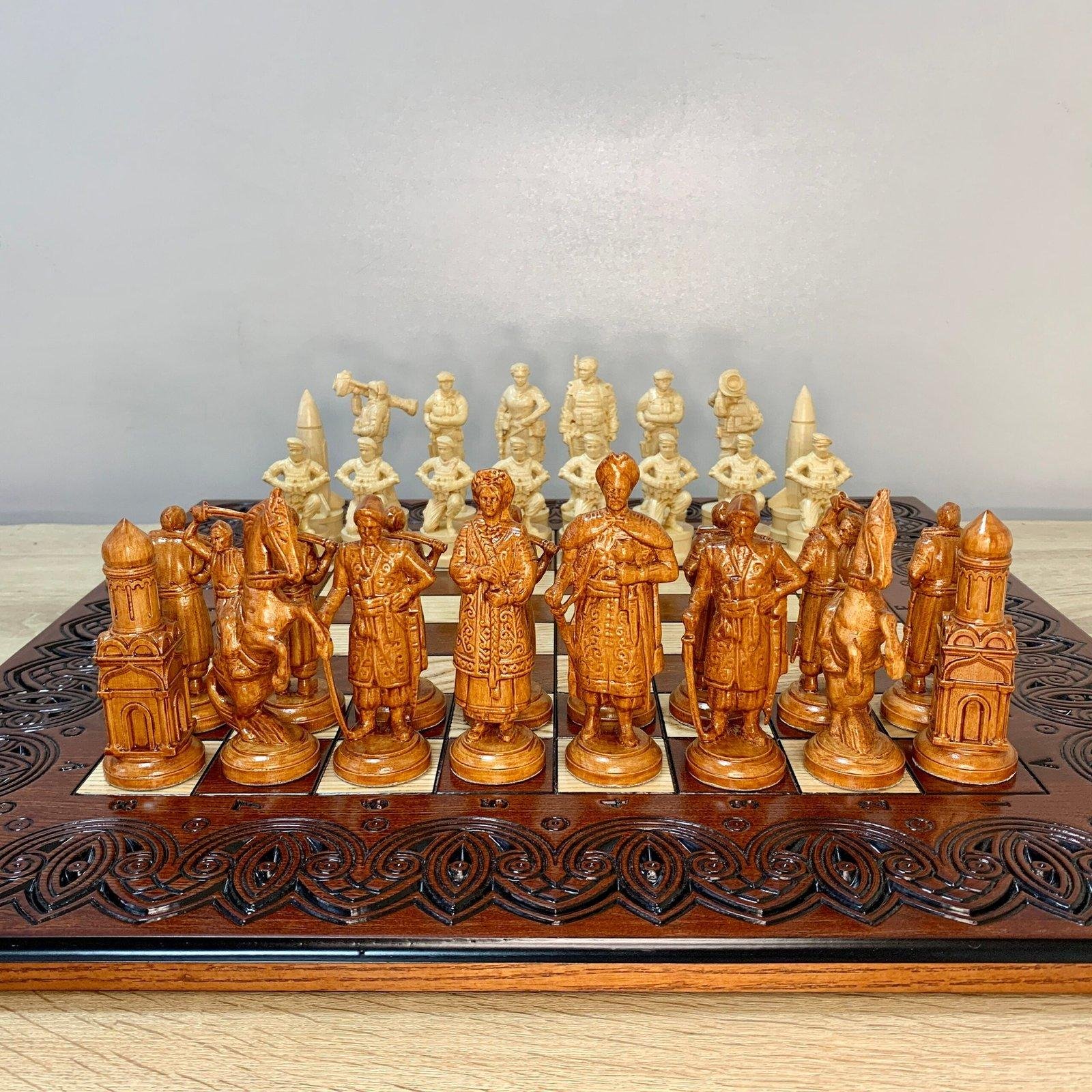 il_fullxfull.5757994118_ducl-scaled-1.jpg A chess set with a carved ash board and unique pieces "Cossacks" and "Armed Forces of Ukraine"