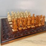 Unique chess set: carved ash board and 32 chess pieces - Ukrainian Cossacks against medieval knights