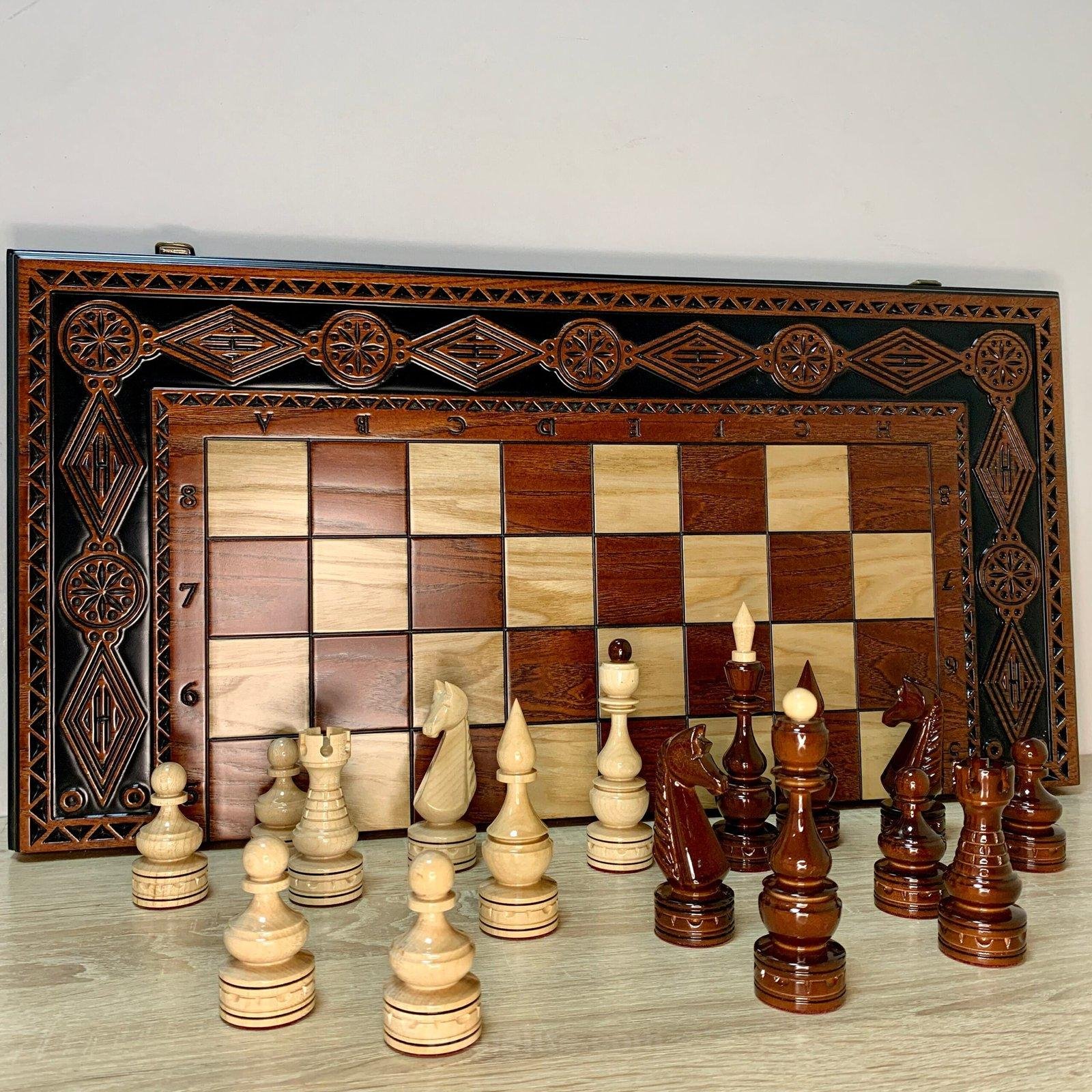 il_fullxfull.5805860415_49k9-scaled-1.jpg Chess set: Elegant folding chess board with wooden carved figures