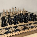 Chess set: Handmade folding chess board with carved wooden figures