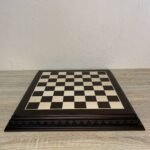 Handcrafted ash chess board in dark brown is a classic choice for family games and everyday leisure