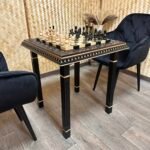 Classic wooden chess set on handcrafted ash wood table